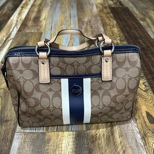 Coach satchel with navy stripe.  Blue interior good condition see photos